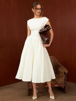 AURELIA | Vestido midi con abertura circular en la espalda