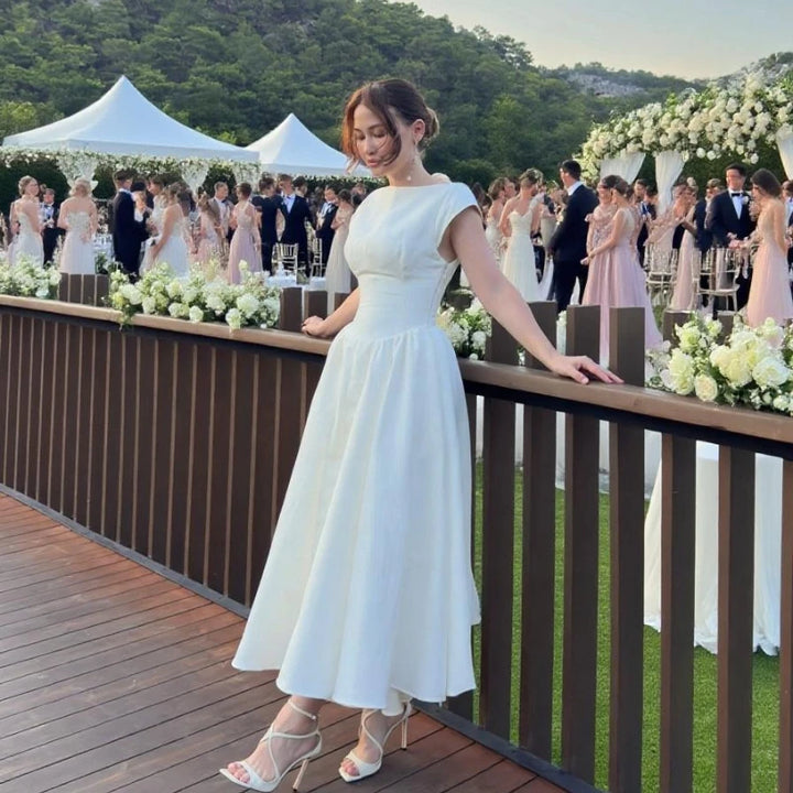 AURELIA | Vestido midi con abertura circular en la espalda