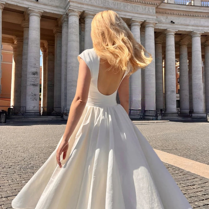 AURELIA | Vestido midi con abertura circular en la espalda