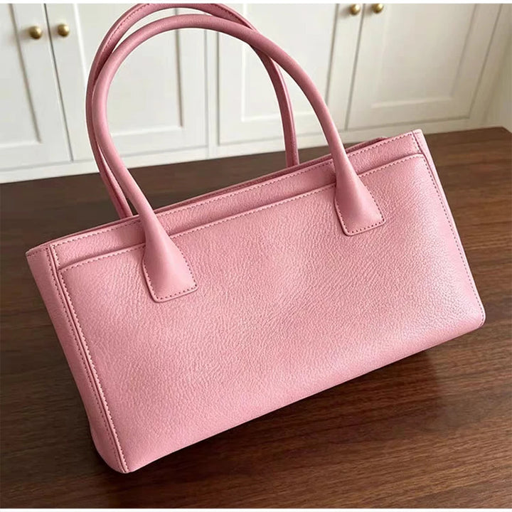 LIVIA | Bolso versátil con acabado texturizado