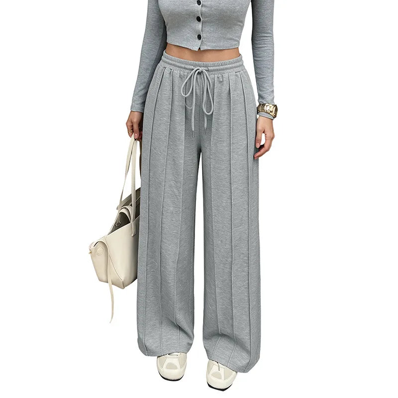 KAIA | Pantalón jogger plisado de pierna ancha