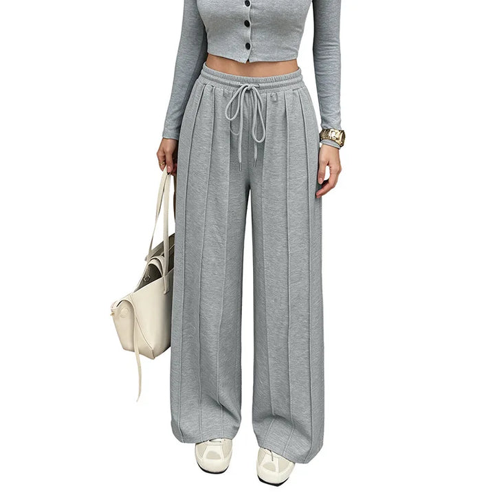 KAIA | Pantalón jogger plisado de pierna ancha