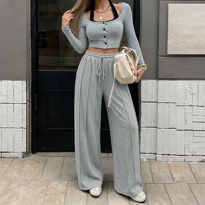 KAIA | Pantalón jogger plisado de pierna ancha